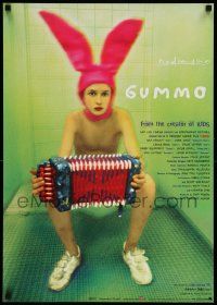 5y441 GUMMO Japanese '98 wacky image of man on toilet wearing bunny hat & playing accordion!