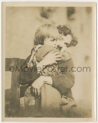 6d010 KID 8x10.25 still '21 best c/u of Charlie Chaplin hugging young Jackie Coogan from 1-sheet!