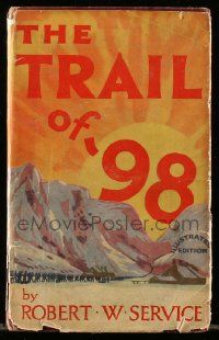 6d731 TRAIL OF '98 English hardcover book '28 Robert Service novel illustrated with movie scenes!