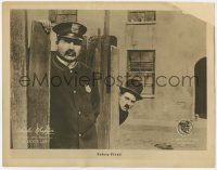 6j147 DOG'S LIFE LC '18 Charlie Chaplin hiding behind fence sees policeman, safety first!