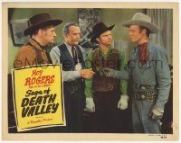 6j435 SAGA OF DEATH VALLEY LC R49 three guys watch cowboy Roy Rogers handing them some cash!