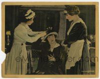 6j534 FLOOR BELOW LC '18 two maids attend to reporter Mabel Normand!