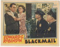 7c307 BLACKMAIL LC '39 Ruth Hussey tells policemen that Edward G. Robinson is innocent!