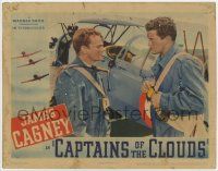 7c352 CAPTAINS OF THE CLOUDS LC '42 c/u of James Cagney glaring at Dennis Morgan by WWII bi-plane!