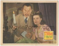 7c358 CASTLE IN THE DESERT LC '42 Sidney Toler as Charlie Chan holding candle by Arleen Whelan!