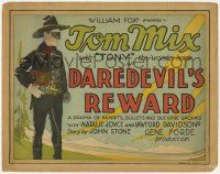 7c089 DAREDEVIL'S REWARD TC '28 great image of masked cowboy Tom Mix pointing his gun, lost film!