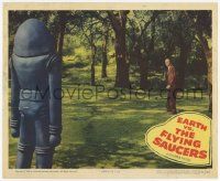 7c438 EARTH VS. THE FLYING SAUCERS LC '56 huge alien robot stares down man standing in park!