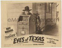 7c449 EYES OF TEXAS LC R52 Roy Rogers with rifle & Andy Devine take cover behind a mailbox!