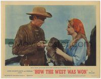 7c563 HOW THE WEST WAS WON LC #6 '64 James Stewart gives Carroll Baker something to remember him by