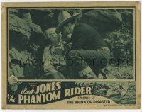 7c727 PHANTOM RIDER chapter 3 LC '36 c/u of cowboy Buck Jones helping wounded man, Universal serial