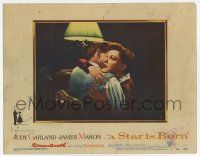 7c869 STAR IS BORN LC #2 '54 great close up of sad Judy Garland hugging James Mason, classic!