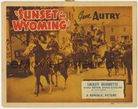 7c209 SUNSET IN WYOMING TC '41 Gene Autry & Smiley Burnette on horseback leading parade!