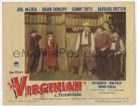 7c958 VIRGINIAN LC #8 '46 four people with Joel McCrea carrying luggage in front of hotel!