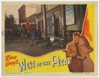 7c971 WEST OF THE PECOS LC '45 great image of Robert Mitchum with gun fighting in the street!