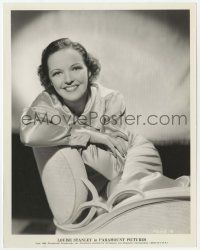 7d591 LOUISE STANLEY 8x10.25 still '36 the pretty smiling actress seated backwards in chair!