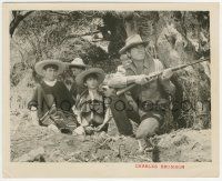 7d615 MAGNIFICENT SEVEN 8.25x10 still '60 close up of Charles Bronson with rifle & Mexican kids!