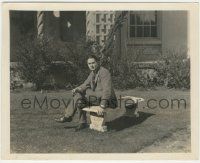 7d972 WILLIAM HAINES 8x10 still '20s seated on bench at home, top gay star turned decorator!