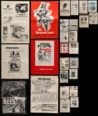 7h069 LOT OF 31 UNCUT PRESSBOOKS AND SUPPLEMENTS '50s-70s advertising for a variety of movies!