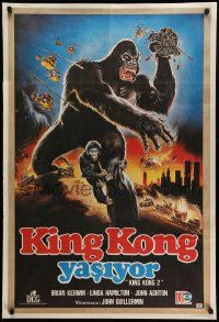 7j356 KING KONG LIVES Turkish '89 great artwork of huge unhappy ape attacked by army!