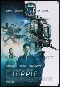 7t066 CHAPPIE advance Swiss '15 images of Dev Patel, Hugh Jackman and robot with rifle!