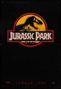 7w763 JURASSIC PARK teaser 1sh '93 Steven Spielberg, classic logo with T-Rex over yellow background
