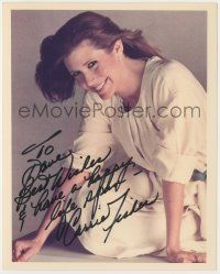 7x1055 CARRIE FISHER signed color 8x10 REPRO still '90s great smiling portrait sitting on ground!