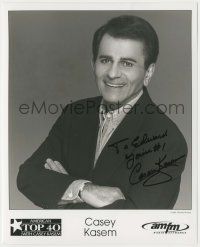 7x0624 CASEY KASEM signed 8x10 publicity still '90s smiling portrait of the famous radio personality