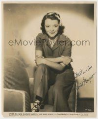 7x0772 JANET GAYNOR signed 7.75x9.5 still '35 full-length sitting on arm of chair in One More Spring