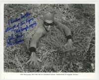 7x1288 JOHN HART signed 8x10 REPRO still '80s in costume as Captain Africa sinking in quicksand!