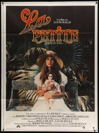 7y537 PRETTY BABY French 1p '78 directed by Louis Malle, young Brooke Shields sitting with doll!