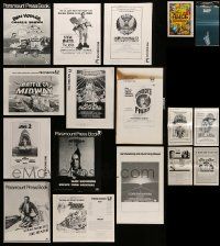 8a195 LOT OF 17 UNCUT PRESSBOOKS '60s-80s advertising images for a variety of different movies!