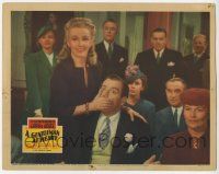 8f602 GENTLEMAN AT HEART LC '42 close up of smiling Carole Landis covering Cesar Romero's mouth!