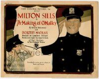 8f193 MAKING OF O'MALLEY TC '25 little Helen Rowland with police cap salutes cop Milton Sills!