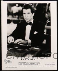 8h076 GOLDENEYE presskit w/ 14 stills '95 Pierce Brosnan as Bond, Scorupco, Famke Janssen!