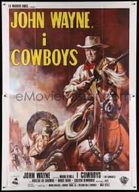 8j045 COWBOYS Italian 2p '72 cool different art of John Wayne with rifle on horseback!