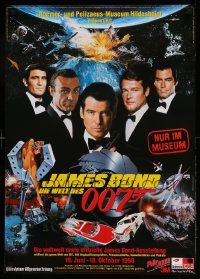 8p121 JAMES BOND DIE WELT DES 007 German '98 Bond film festival, cool image of all Bond actors!