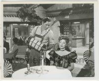 8r307 ESCAPE ME NEVER 8x10 still '48 Errol Flynn playing accordion for Eleanor Parker at cafe!