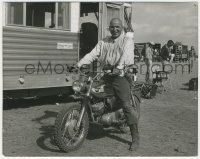 8r807 SCALPHUNTERS candid 8x10.25 still '68 Telly Savalas proudly displaying his motorcycle!