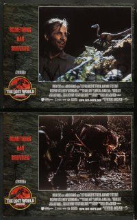 8w214 JURASSIC PARK 2 8 LCs '96 The Lost World, Steven Spielberg, something has survived!