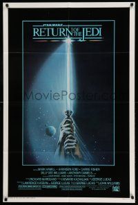 8y669 RETURN OF THE JEDI 1sh '83 George Lucas, art of hands holding lightsaber by Tim Reamer!