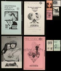 9a235 LOT OF 18 UNCUT PRESSBOOKS '60s-70s advertising images for a variety of different movies!
