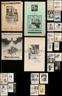 9a225 LOT OF 34 UNCUT PRESSBOOKS '40s-80s advertising for a variety of different movies!