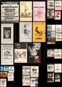 9a221 LOT OF 49 UNCUT PRESSBOOKS '60s-70s advertising for a variety of different movies!