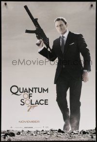 9c697 QUANTUM OF SOLACE teaser 1sh '08 Daniel Craig as Bond with silenced H&K UMP submachine gun