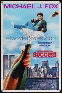 9c774 SECRET OF MY SUCCESS 1sh '87 wacky image of Michael J. Fox & huge bottle of champagne!