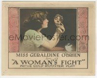 9m814 WOMAN'S FIGHT 8x10 LC '16 pretty yougn Geraldine O'Brien looks at herself in mirror!