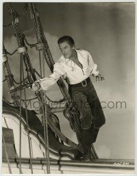 1d042 AGAINST ALL FLAGS deluxe 11x14.25 still '52 close up of Errol Flynn with gun on pirate ship!