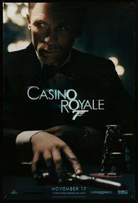 1g193 CASINO ROYALE teaser DS 1sh '06 Craig as James Bond sitting at poker table w/gun!