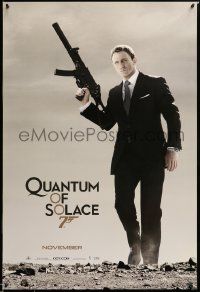 1g712 QUANTUM OF SOLACE teaser DS 1sh '08 Daniel Craig as Bond with silenced H&K UMP submachine gun