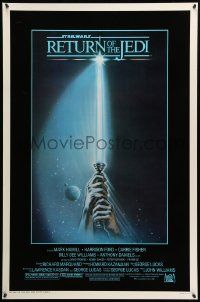 1g009 RETURN OF THE JEDI 1sh '83 George Lucas, art of hands holding lightsaber by Tim Reamer!